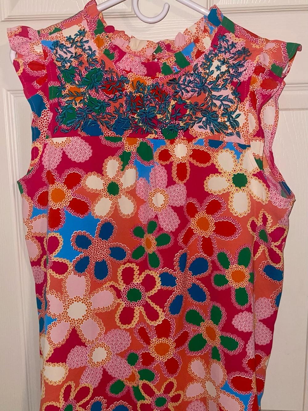Vibrant Floral Sleeveless Blouse with Embroidered Yoke